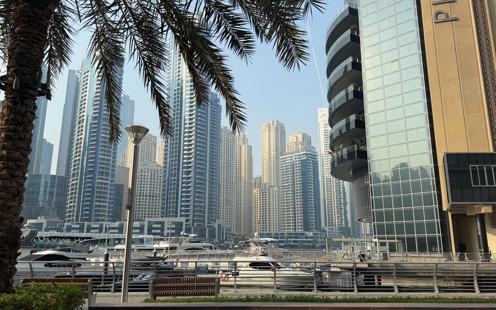 Dubai Marina towers and yachts seen from the marina walk, photographed by Stefano Iannotti